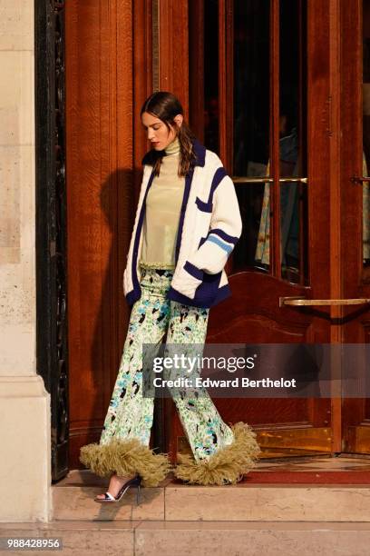 Alexa Chung, outside the Miu Miu Cruise Collection show, outside the Hotel Regina, in Paris, on June 30, 2018 in Paris, France.