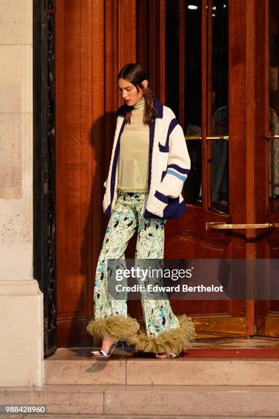 Alexa Chung, outside the Miu Miu Cruise Collection show, outside the Hotel Regina, in Paris, on June 30, 2018 in Paris, France.