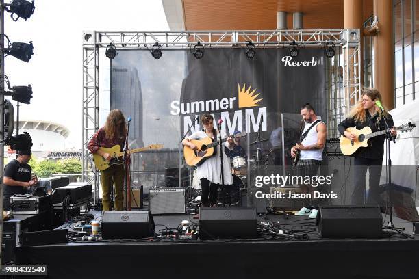 Lillie Mae performs on stage outside the Music City Center at the Reverb Stage on the Terrace during The Make Music Experience at Summer NAMM on June...