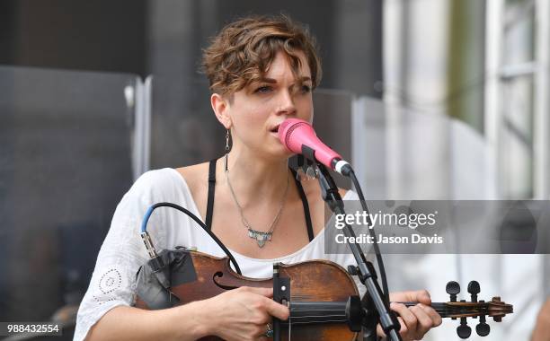 Lillie Mae performs on stage outside the Music City Center at the Reverb Stage on the Terrace during The Make Music Experience at Summer NAMM on June...