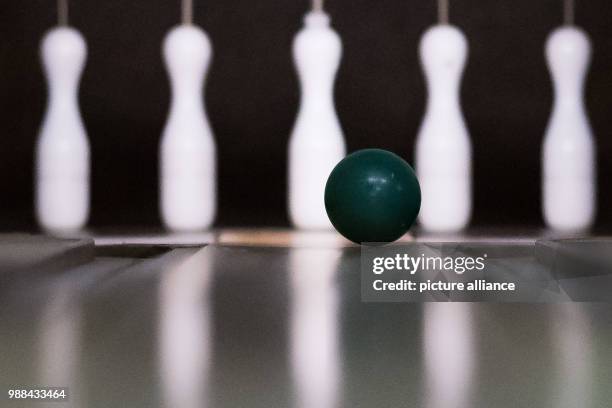 Bowling ball hits the pins of a fully automated bowling alley at the bowling centre in Bovenden, Germany, 1 December 2017. Bowling used to be popular...