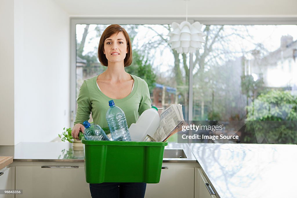 Woman doing recycling