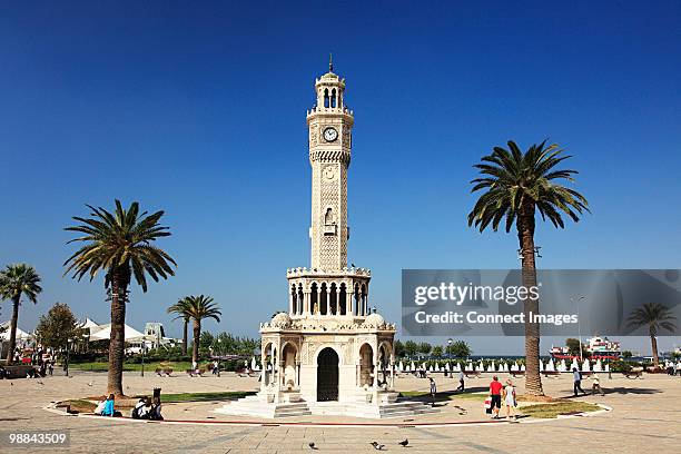 clock tower in konak square izmir turkey - izmir turkey stock pictures, royalty-free photos & images