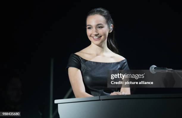 Pianist Emily Bear performing on stage during the 'Night Of The Proms' at the Barclaycard Arena in Hamburg, Germany, 1 December 2017. Photo: Daniel...
