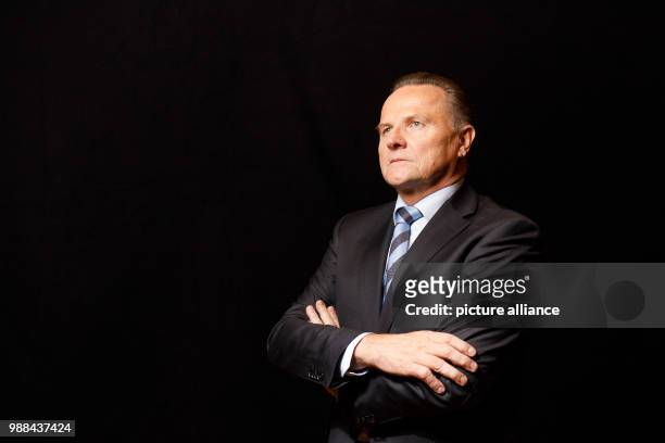 Georg Pazderski, state chairman of the Alternative for Germany Berlin, stands in a mobile photo studio in the course of the AfD's party conference at...