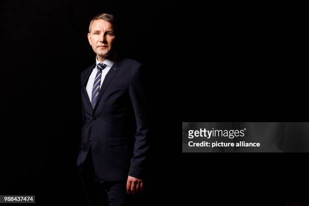 Bjoern Hoecke, leader of the faction of the Alternative for Germany in Thuringia, stands in a mobile photo studio in the course of the AfD's party...