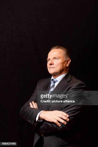 Georg Pazderski, state chairman of the Alternative for Germany Berlin, stands in a mobile photo studio in the course of the AfD's party conference at...
