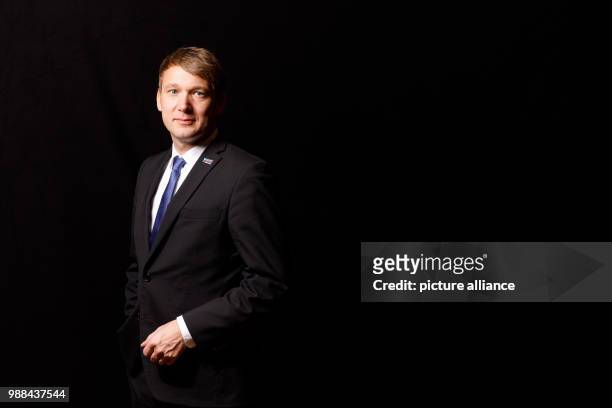 Andre Poggenburg, state chairman of the Alternative for Germany Saxony-Anhalt, stands in a mobile photo studio in the course of the AfD's party...
