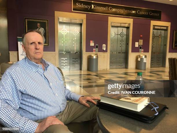 John Ryan, posing June 21, 2018 after a medical appointment at the Sidney Kimmel Cancer Center at Johns Hopkins hospital in Baltimore, Maryland, was...