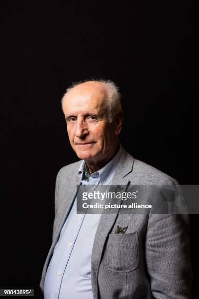 Albrecht Glaser, deputy chairman of the Alternative for Germany , stands in a mobile photo studio in the course of the AfD's party conference at the...
