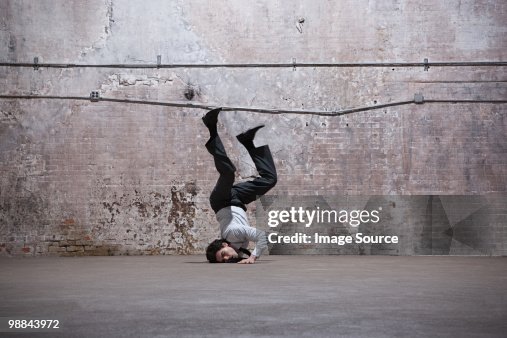 Man Fall Front View Man Falling On Head In Warehouse High-Res Stock Photo - Getty Images