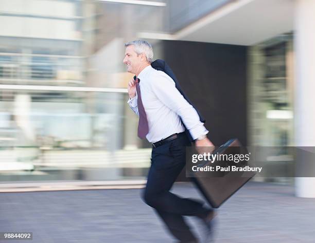 Busness Man Rushing Paul Bradbury Photos and Premium High Res Pictures - Getty Images
