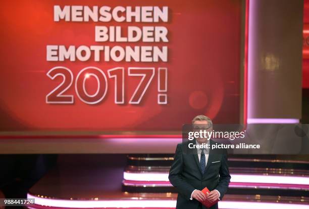 Host Guenther Jauch stands on stage during the recording of the RTL broadcasting end-of-the-year review TV show '2017! Menschen, Bilder, Emotionen'...