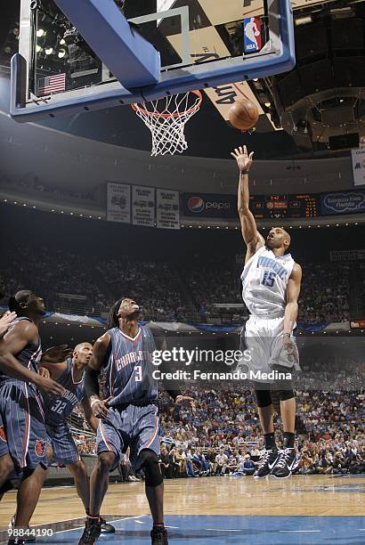 Vince Carter of the Orlando Magic puts a shot up against Gerald Wallace of the Charlotte Bobcats in Game Two of the Eastern Conference Quarterfinals...