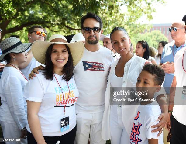 America Ferrera, Lin-Manuel Miranda, Alicia Keys and her son Egypt pose during Families Belong Together Rally In Washington DC Sponsored By MoveOn,...