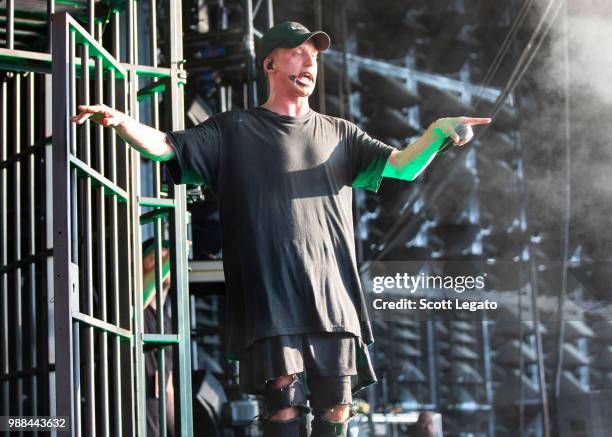 Rapper NF performs during the Bobby Tarantino vs. Everybody Tour at DTE Energy Center on June 30, 2018 in Clarkston, Michigan.