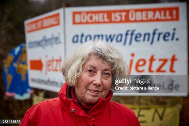 Peace activist Elke Koller stands on the 'Peace Meadow' near the Bundeswehr army air field in Buechel, Germany, 27 November 2017. The town is located...