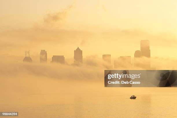 silhouette of seattle highrises through fog, washington - elliott bay bildbanksfoton och bilder