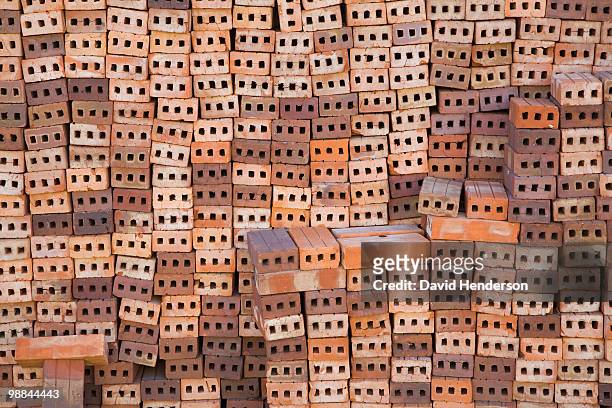 stack of terracotta bricks - havana pattern stock pictures, royalty-free photos & images