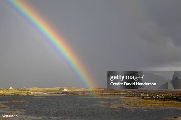 rainbow and hills, north uist, hebrides - david wish stock pictures, royalty-free photos & images