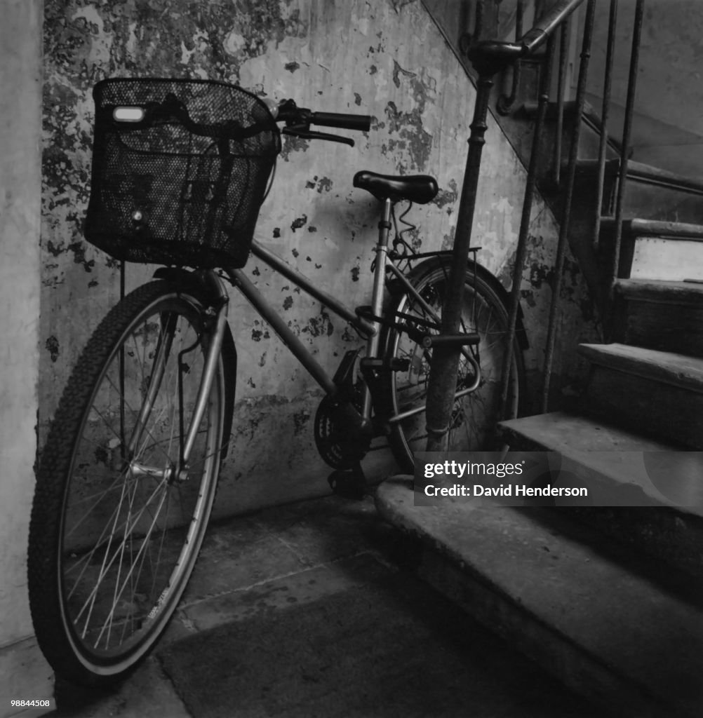 Old-fashioned bicycle in stairwell