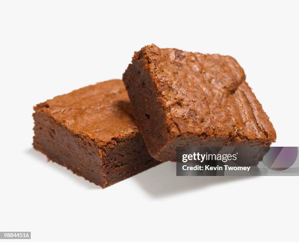 close up of two chocolate brownies - brownie fotografías e imágenes de stock