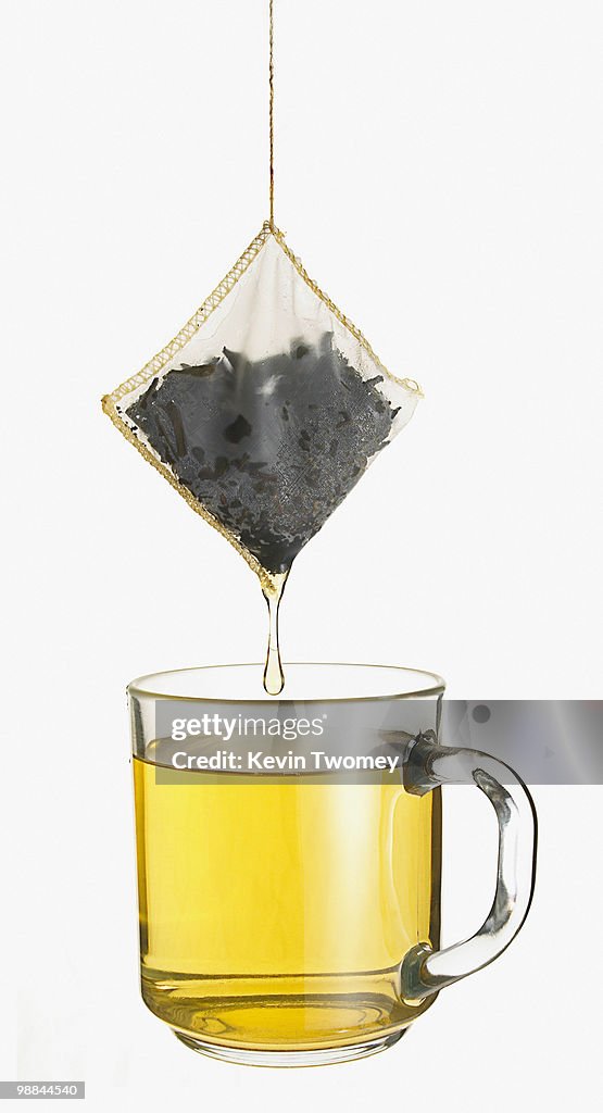 Close up of cup of tea and dripping tea bag