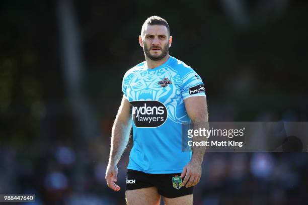 Robbie Farah of the Tigers warms up before the round 16 NRL match between the Wests Tigers and the Gold Coast Titans at Leichhardt Oval on July 1,...