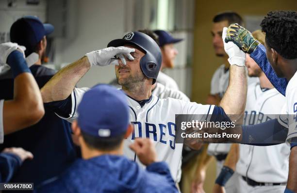 Matt Szczur of the San Diego Padres gestures after scoring during the sixth inning of a baseball game against the Pittsburgh Pirates at PETCO Park on...