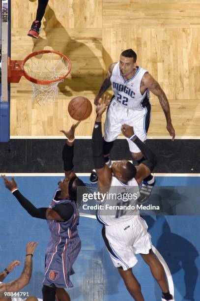 Gerald Wallace of the Charlotte Bobcats puts a shot up against Dwight Howard of the Orlando Magic in Game Two of the Eastern Conference Quarterfinals...