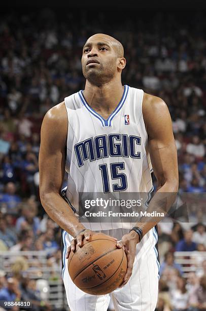 Vince Carter of the Orlando Magic looks to make a free throw against Charlotte Bobcats in Game Two of the Eastern Conference Quarterfinals during the...