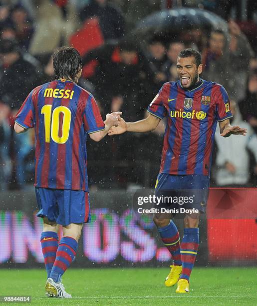 Lionel Messi of Barcelona celebrates with Daniel Alves after scoring Barcelona's fourth goal during the La Liga match between Barcelona and Tenerife...