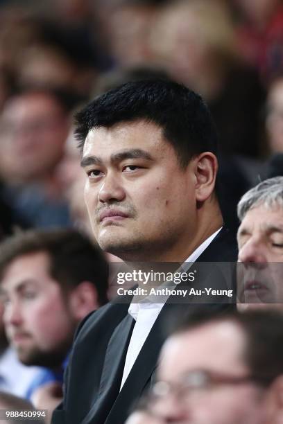 Legend and President of the Chinese Basketball Association Yao Ming watches the action during the FIBA World Cup Qualifying match between the New...