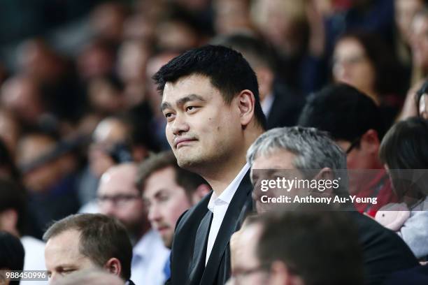 Legend and President of the Chinese Basketball Association Yao Ming watches the action during the FIBA World Cup Qualifying match between the New...