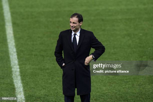 Juventus' head coach Massimiliano Allegri during a walkaround ahead of the UEFA Champions League Group D football match against Olympiakos FC at the...