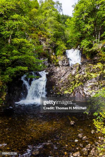 scotland-chia-aig waterfall and witches pool - brook mitchell stock pictures, royalty-free photos & images