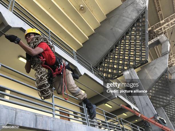 Firefighter practices a manoeuvre at the Zerao soccer stadium in Macapa, Brazil, 17 November 2017. Measurements show that the equator draws through...