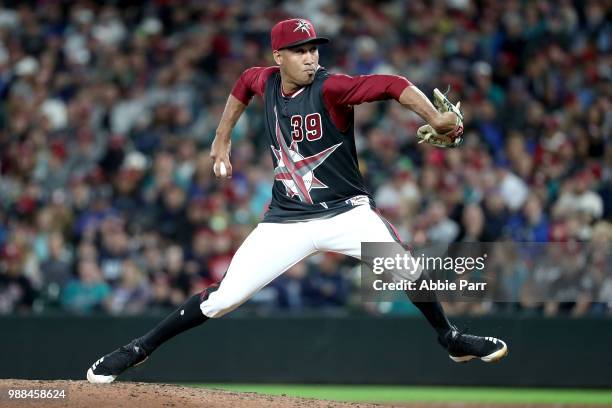 Edwin Diaz of the Seattle Mariners pitches against the Kansas City Royals in the ninth inning during their game at Safeco Field on June 30, 2018 in...