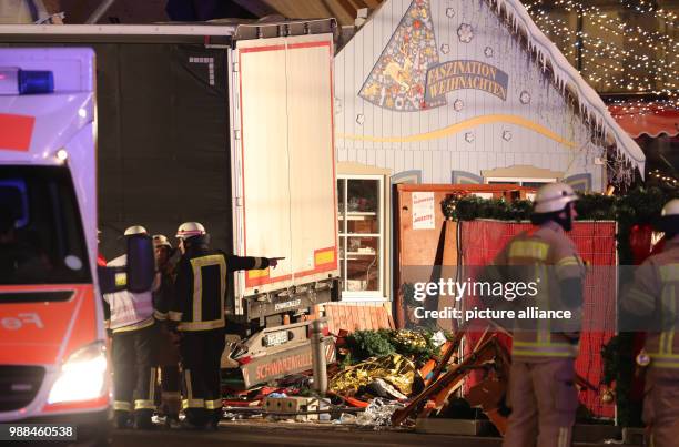 Emergency rescue teams are at work near the memorial church in Berlin, Germany, 19 December 2017. Anis Amri is responsible for having caused a blood...