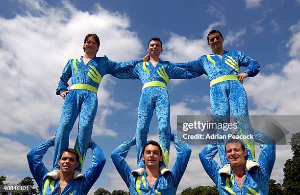 circus acrobats standing on shoulders - human joint stock pictures, royalty-free photos & images