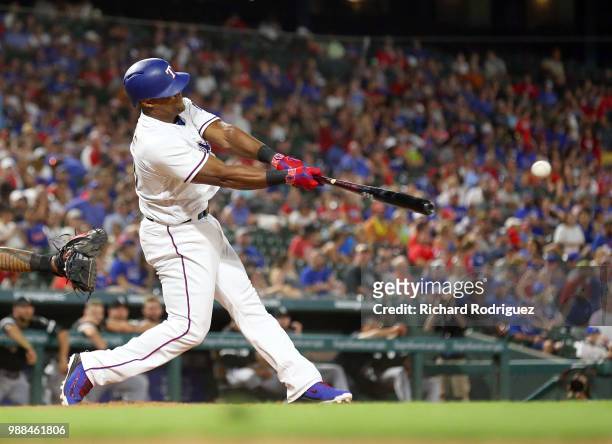 Adrian Beltre of the Texas Rangers hits a single in the eighth inning against the Chicago White Sox at Globe Life Park in Arlington on June 30, 2018...
