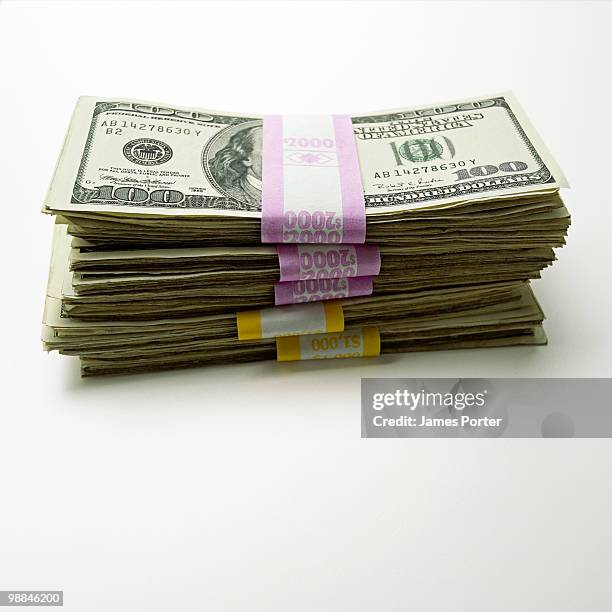 bundle of one hundred dollar bills - bundle stock pictures, royalty-free photos & images