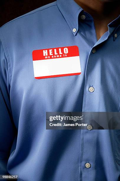 businessman with name tag - name tag fotografías e imágenes de stock