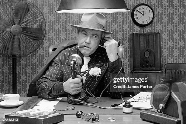 gangster on telephone - antique phone stock pictures, royalty-free photos & images