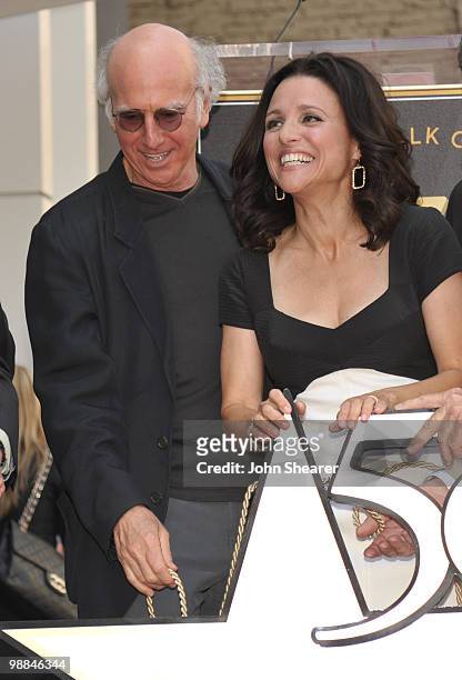 Actor/ Director Larry David and Actress Julia Louis-Dreyfus attend her Hollywood Walk of Fame Star ceremony on May 4, 2010 in Hollywood, California.