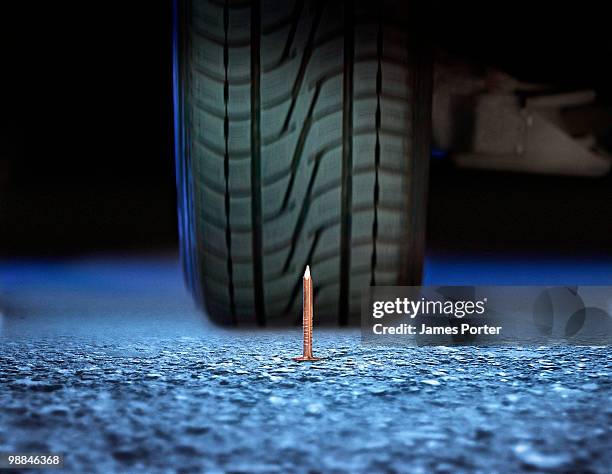 tire and nail - 釘 ストックフォトと画像