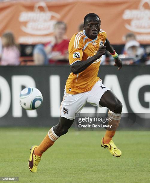 Dominic Oduro of the Houston Dynamo brings the ball up the field against the Kansas City Wizards at Robertson Stadium on May 1, 2010 in Houston,...