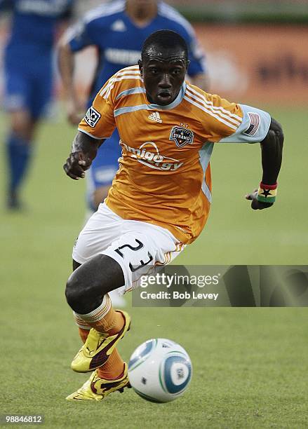 Dominic Oduro of the Houston Dynamo brings the ball up the field against the Kansas City Wizards at Robertson Stadium on May 1, 2010 in Houston,...