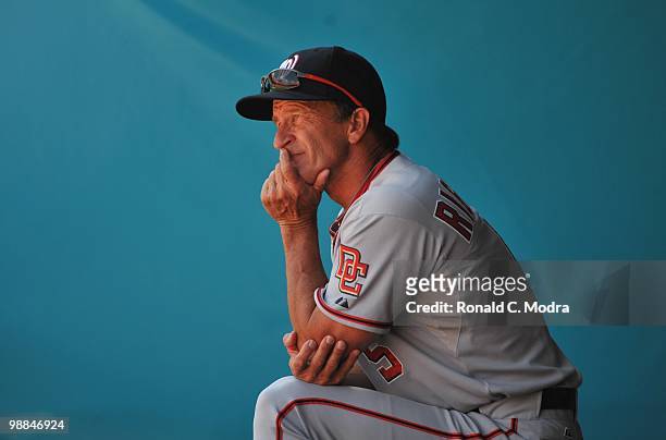 Manager Jim Riggleman of the Washington Nationals in the dugout during a game against the Florida Marlins in Sun Life Stadium on May 2, 2010 in...