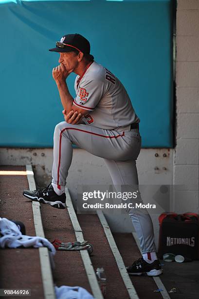 Manager Jim Riggleman of the Washington Nationals in the dugout during a game against the Florida Marlins in Sun Life Stadium on May 2, 2010 in...